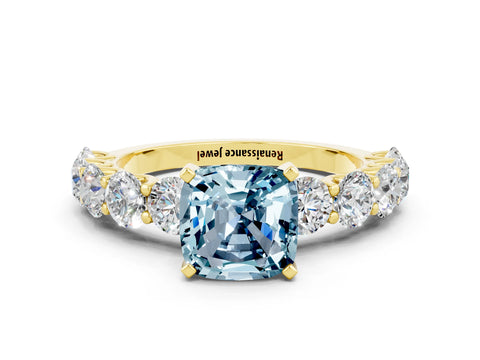 Yellow gold Cushion Cut Aquamarine Prong Setting with Side Stones on a Pave Band