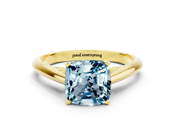 Yellow gold Cushion Cut Aquamarine Solitaire Engagement Ring with Cathedral Setting and Four-Prong Mount