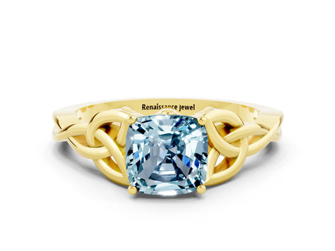 Yellow gold Cushion Cut Aquamarine Solitaire Engagement Ring with Celtic Knot Band and Four-Prong Setting