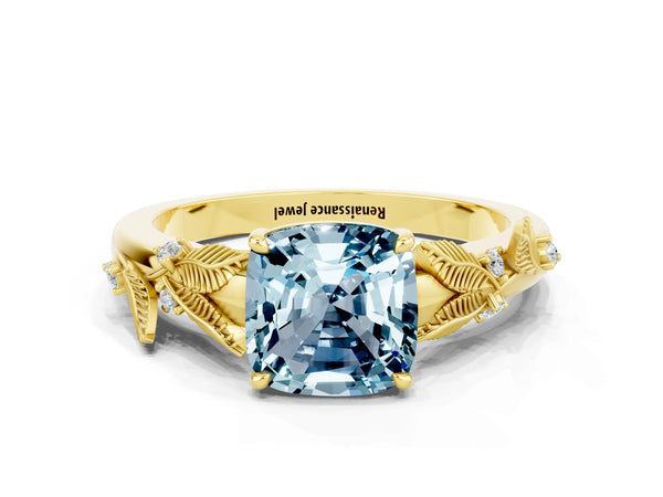 Yellow gold Cushion Cut Aquamarine Solitaire Ring with Leaf Motif Band and Four-Prong Setting