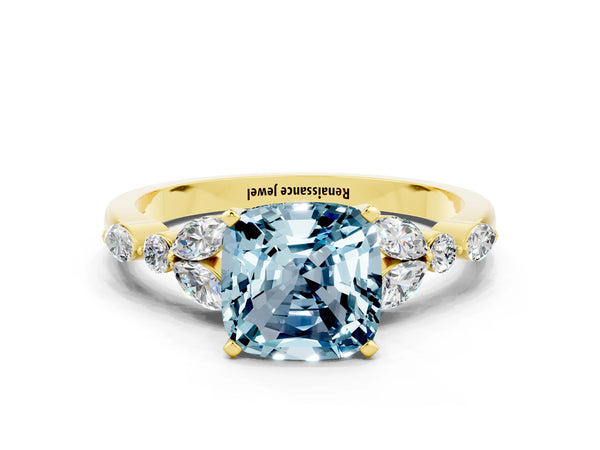 Yellow gold Cushion Cut Aquamarine Solitaire Ring with Side Stones and Four-Prong Setting