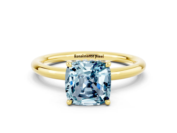 Yellow gold Cushion Cut Aquamarine Solitaire Ring with Thin Band and Four-Prong Setting
