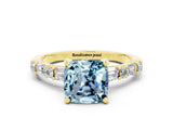 Yellow gold Cushion Cut Aquamarine Solitaire with Side Baguettes and Channel Set Band
