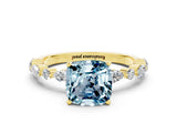 Yellow gold Cushion Cut Aquamarine Solitaire with Side Stones on a Pavé Band and Four-Prong Setting
