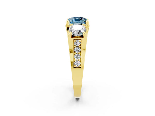 Yellow gold Cushion Cut Aquamarine Three-Stone Ring with Channel Set Band and Four-Prong Setting