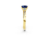 Yellow gold Cushion Cut Blue Sapphire Engagement Ring with Side Stone Accents and Four-Prong Setting_26