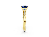 Yellow gold Cushion Cut Blue Sapphire Engagement Ring with Side Stone Accents and Four-Prong Setting_29