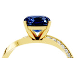Yellow gold Cushion Cut Blue Sapphire Engagement Ring with Side Stone Accents and Four-Prong Setting_88