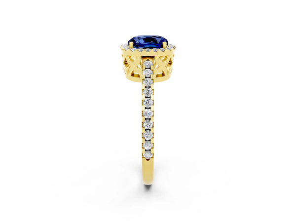Yellow gold Cushion Cut Blue Sapphire Halo Engagement Ring with Pavé Band and Prong Setting