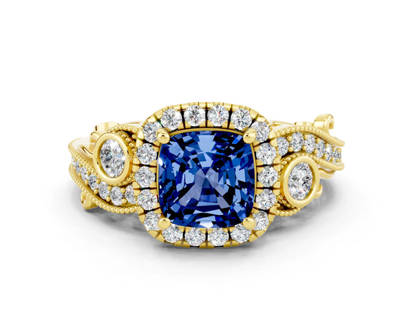 Yellow gold Cushion Cut Blue Sapphire Halo Ring with Milgrain Pavé Band and Four-Prong Setting