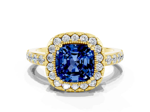 Yellow gold Cushion Cut Blue Sapphire Halo Ring with Pavé Band and Prong Setting