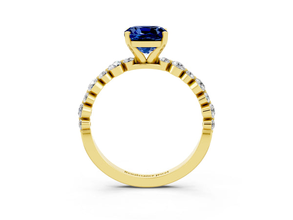 Yellow gold Cushion Cut Blue Sapphire Prong Set Engagement Ring with Pavé Band