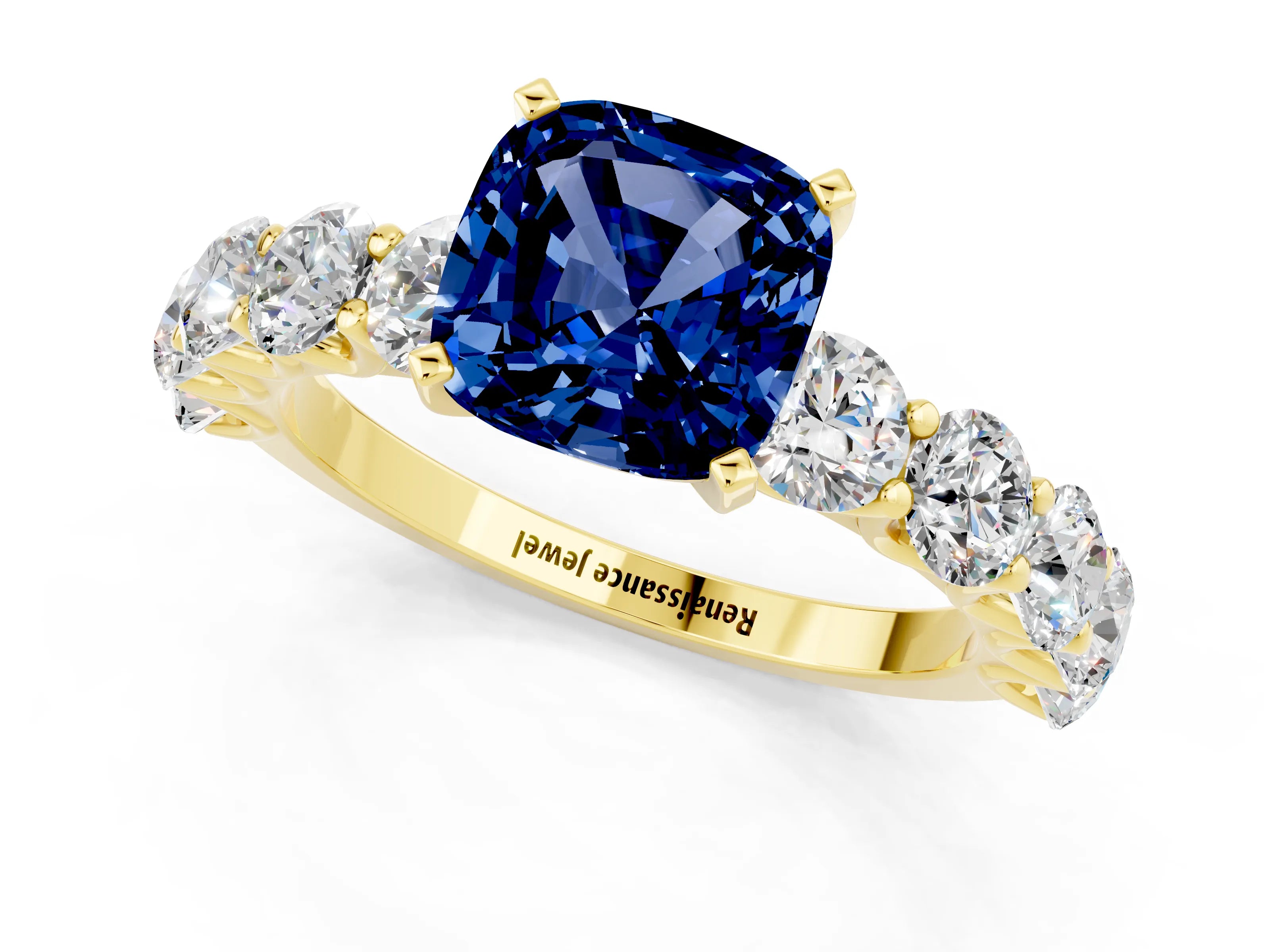 Yellow gold Cushion Cut Blue Sapphire Prong Setting with Side Stones on a Pave Band_1