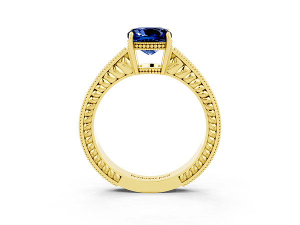 Yellow gold Cushion Cut Blue Sapphire Ring with Milgrain Pavé Band and Four-Prong Setting