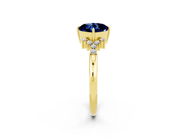 Yellow gold Cushion Cut Blue Sapphire Ring with Side Stones and Four-Prong Setting