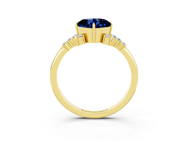 Yellow gold Cushion Cut Blue Sapphire Ring with Side Stones and Four-Prong Setting