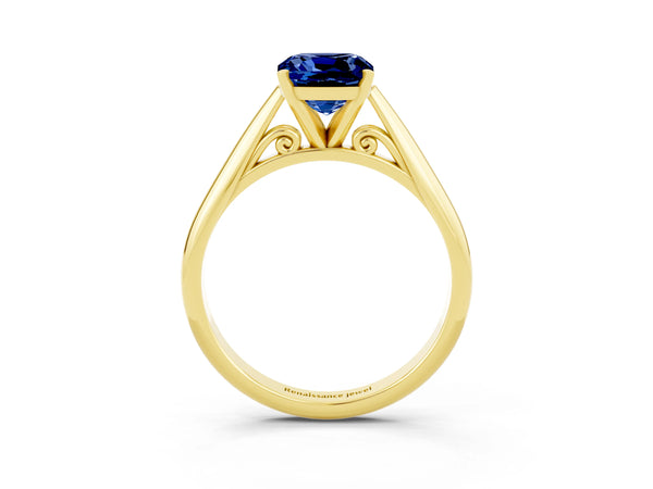 Yellow gold Cushion Cut Blue Sapphire Solitaire Engagement Ring with Cathedral Setting and Four-Prong Mount