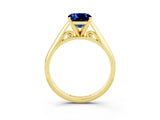 Yellow gold Cushion Cut Blue Sapphire Solitaire Engagement Ring with Cathedral Setting and Four-Prong Mount_81