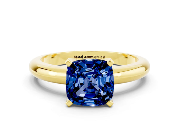 Yellow gold Cushion Cut Blue Sapphire Solitaire Engagement Ring with Round Band and Four-Prong Setting