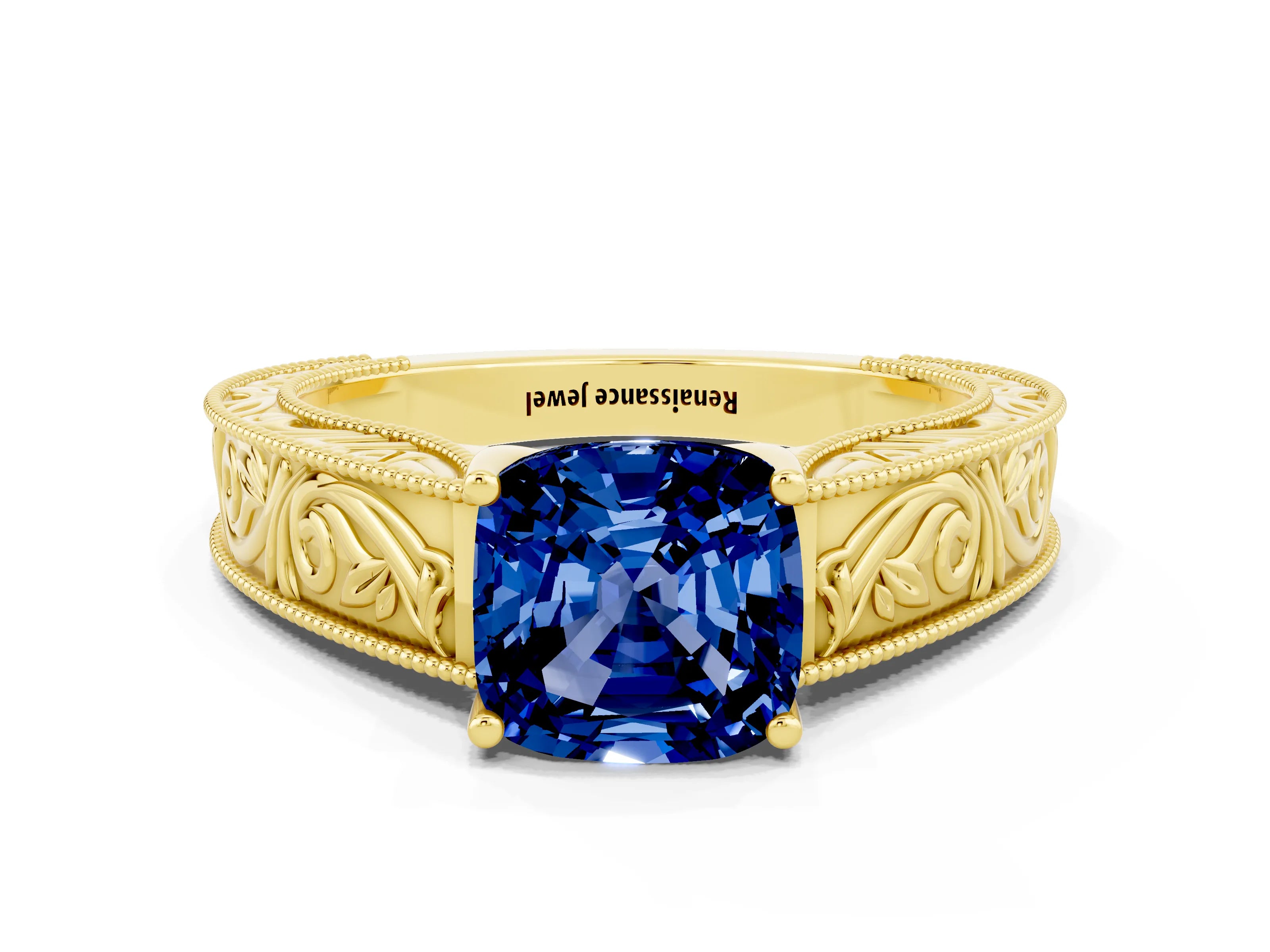 Yellow gold Cushion Cut Blue Sapphire Solitaire Ring with Engraved Band and Four-Prong Setting