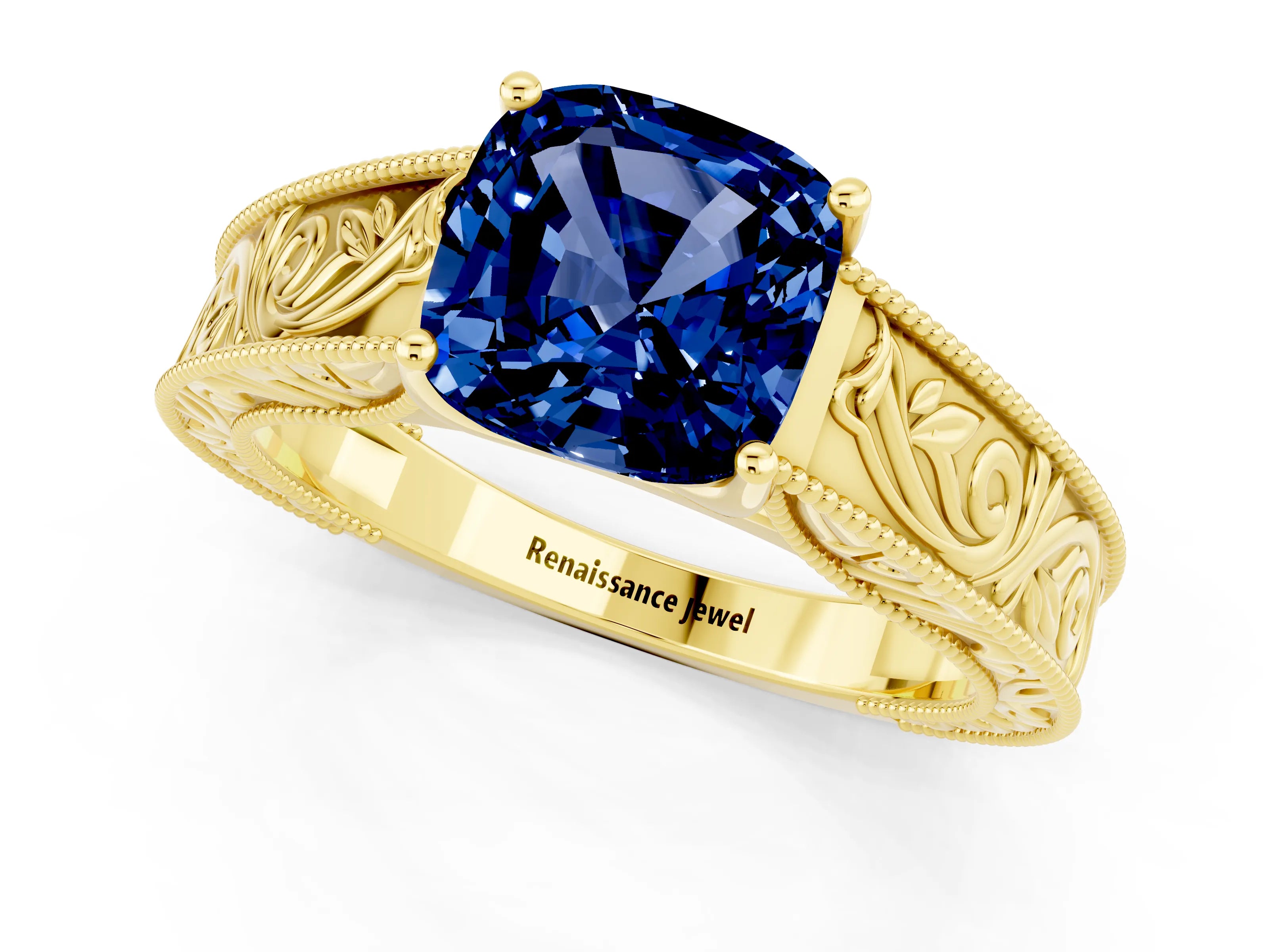 Yellow gold Cushion Cut Blue Sapphire Solitaire Ring with Engraved Band and Four-Prong Setting_1