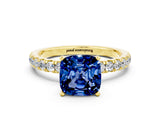Yellow gold Cushion Cut Blue Sapphire Solitaire Ring with Pavé Accents and Four-Prong Setting