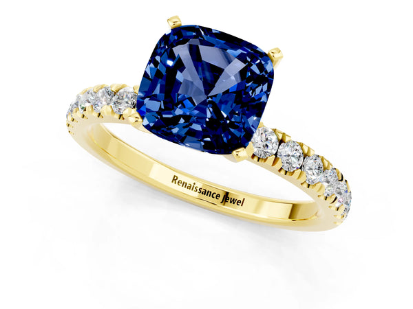 Yellow gold Cushion Cut Blue Sapphire Solitaire Ring with Pavé Accents and Four-Prong Setting