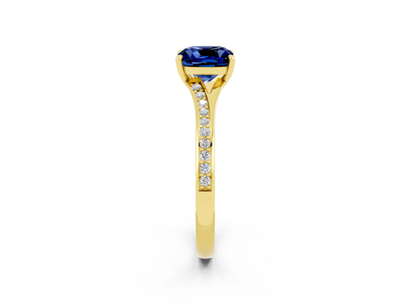 Yellow gold Cushion Cut Blue Sapphire Solitaire Ring with Pavé Band and Prong Setting