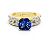 Yellow gold Cushion Cut Blue Sapphire Solitaire Ring with Pavé and Channel Set Band