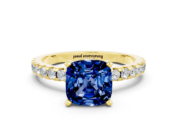 Yellow gold Cushion Cut Blue Sapphire Solitaire Ring with Round Pavé Band and Four-Prong Setting