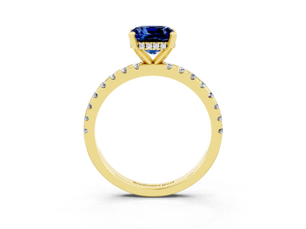 Yellow gold Cushion Cut Blue Sapphire Solitaire Ring with Round Pavé Band and Four-Prong Setting
