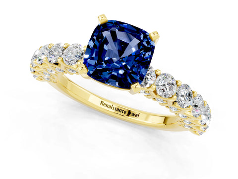 Yellow gold Cushion Cut Blue Sapphire Solitaire Ring with Shared Prong Pavé Band and Four-Prong Setting_1