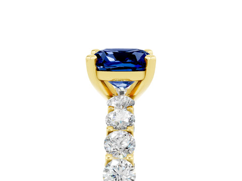 Yellow gold Cushion Cut Blue Sapphire Solitaire Ring with Shared Prong Pavé Band and Four-Prong Setting_5