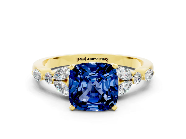Yellow gold Cushion Cut Blue Sapphire Solitaire Ring with Side Stones and Four-Prong Setting