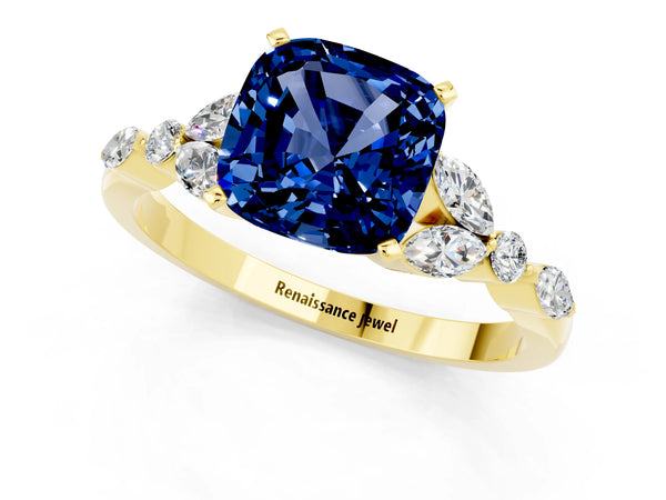 Yellow gold Cushion Cut Blue Sapphire Solitaire Ring with Side Stones and Four-Prong Setting