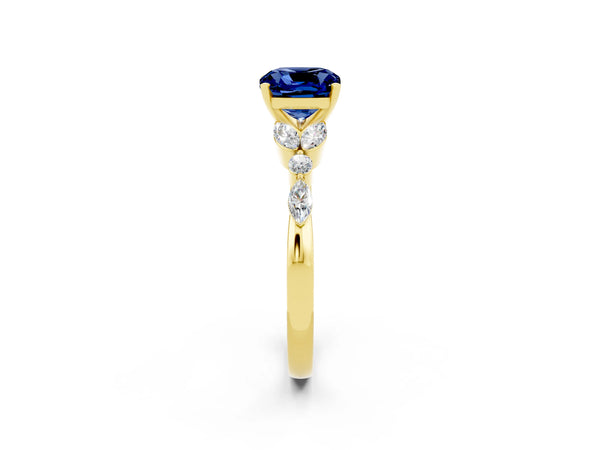Yellow gold Cushion Cut Blue Sapphire Solitaire Ring with Side Stones and Four-Prong Setting