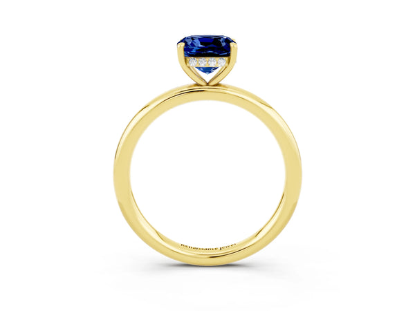Yellow gold Cushion Cut Blue Sapphire Solitaire Ring with Thin Band and Four-Prong Setting