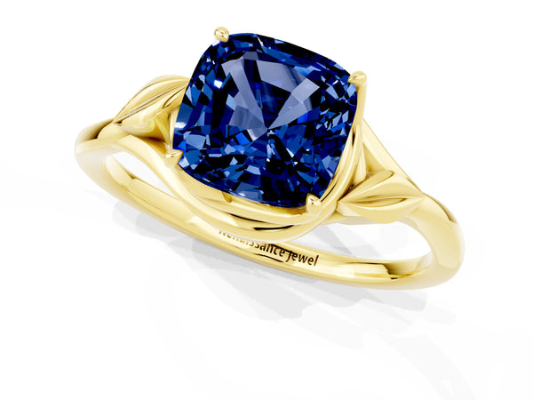 Yellow gold Cushion Cut Blue Sapphire Solitaire Ring with Twist Band and Four-Prong Setting