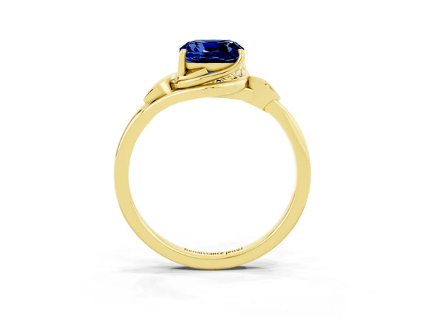 Yellow gold Cushion Cut Blue Sapphire Solitaire Ring with Twist Band and Four-Prong Setting