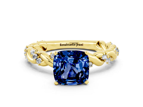 Yellow gold Cushion Cut Blue Sapphire Solitaire Ring with Twisted Band and Pavé Accents