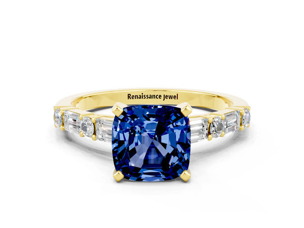 Yellow gold Cushion Cut Blue Sapphire Solitaire with Side Baguettes and Channel Set Band
