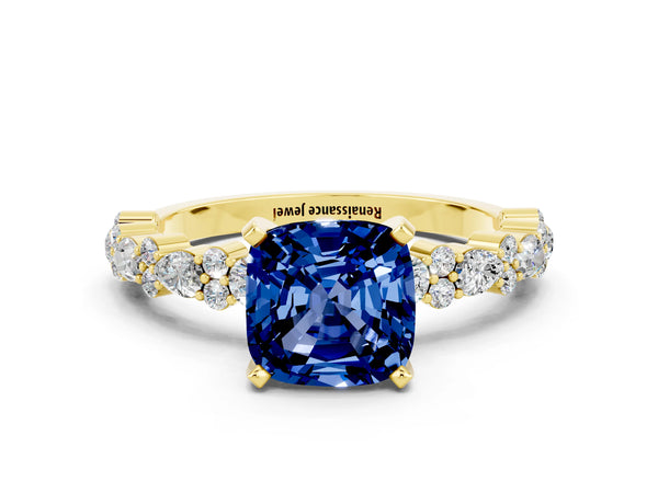 Yellow gold Cushion Cut Blue Sapphire Side Stone Solitaire Ring with Round  and Four-Prong Setting