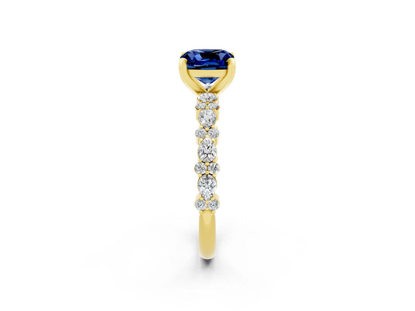 Yellow gold Cushion Cut Blue Sapphire Side Stone Solitaire Ring with Round  and Four-Prong Setting