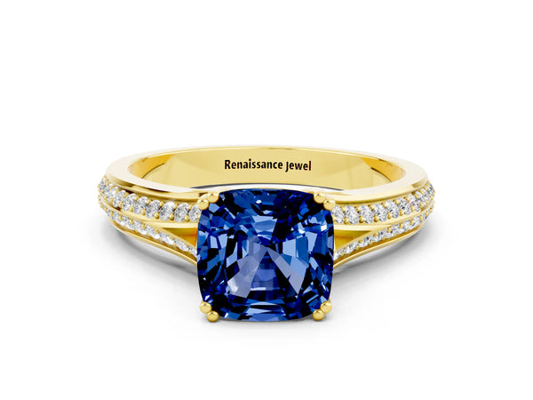 Yellow gold Cushion Cut Blue Sapphire Split Shank Engagement Ring with Pavé Band