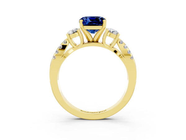 Yellow gold Cushion Cut Blue Sapphire Three-Stone Ring with Pavé Split Shank and Four-Prong Setting