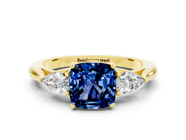 Yellow gold Cushion Cut Blue Sapphire Three-Stone Ring with Pear  Side Stones and Prong Setting