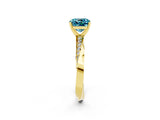 Yellow gold Cushion Cut Blue Topaz Engagement Ring with Side Stone Accents and Four-Prong Setting_26