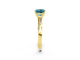 Yellow gold Cushion Cut Blue Topaz Engagement Ring with Side Stone Accents and Four-Prong Setting_86