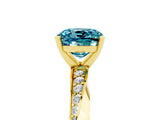Yellow gold Cushion Cut Blue Topaz Engagement Ring with Side Stone Accents and Four-Prong Setting_89