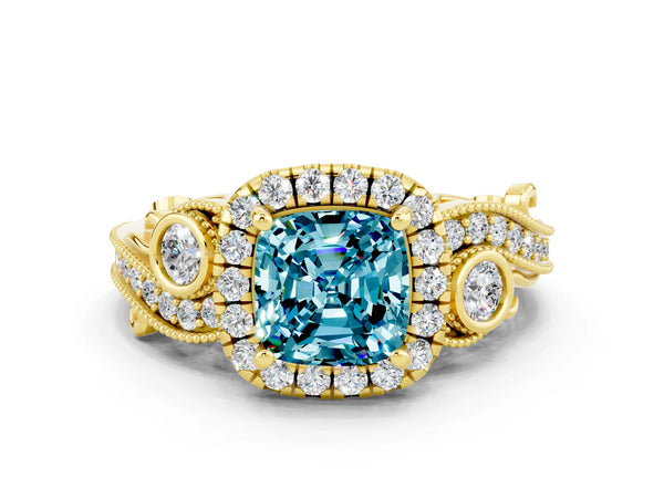 Yellow gold Cushion Cut Blue Topaz Halo Ring with Milgrain Pavé Band and Four-Prong Setting